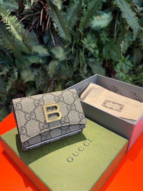 gucci balenciaga chain wallet|Gucci and Balenciaga collaboration.